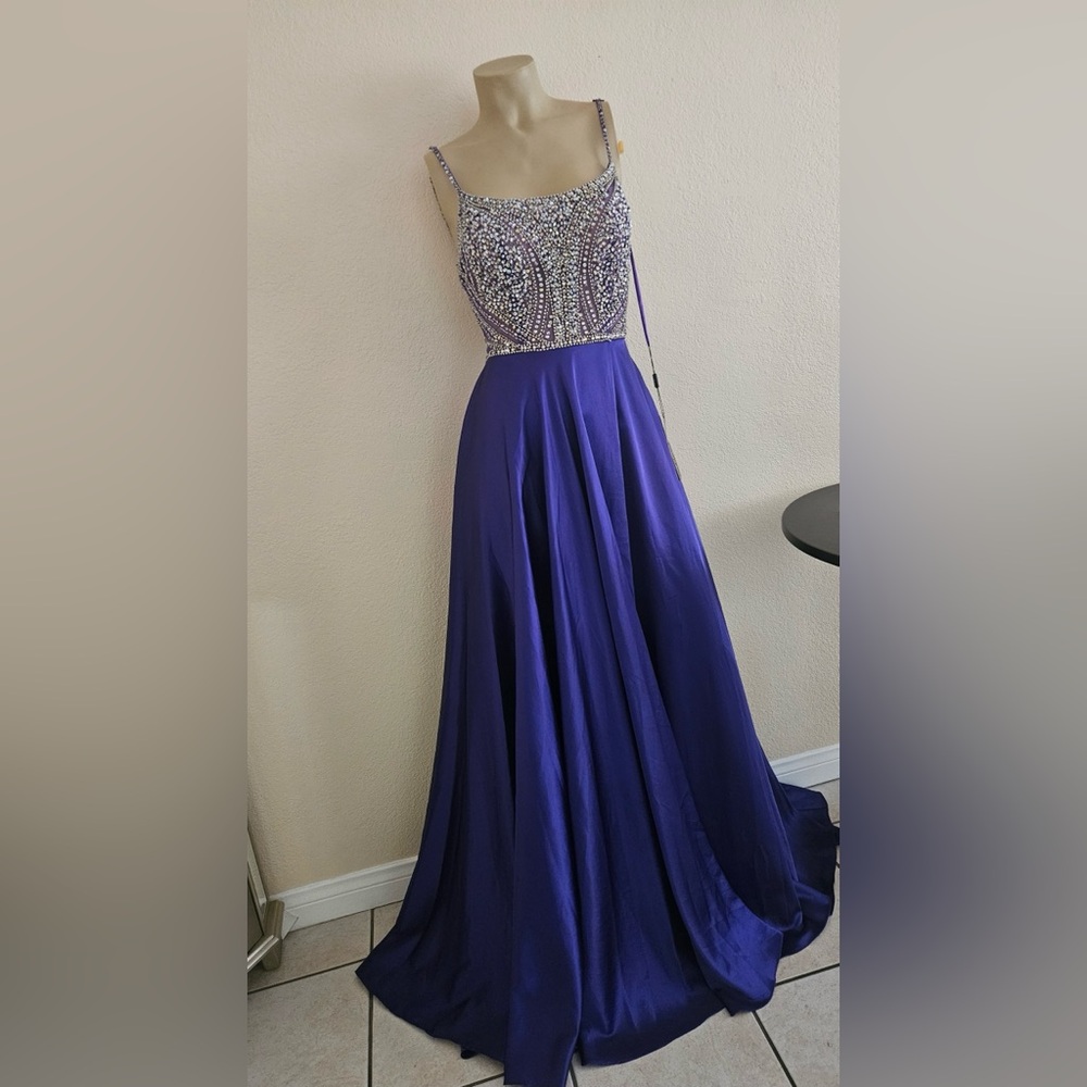 Aspeed Ballgown features heavily beaded and jewelry bodice, spaghetti straps